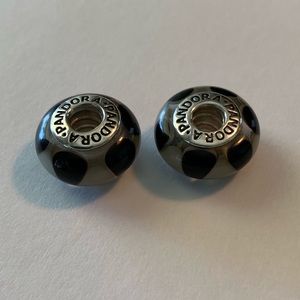 Two Pandora black and gray murano glass beads